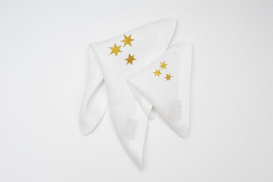 Gilded Elegance: White Embroidered Table Napkins with a Touch of Gold Sewing Fiesta